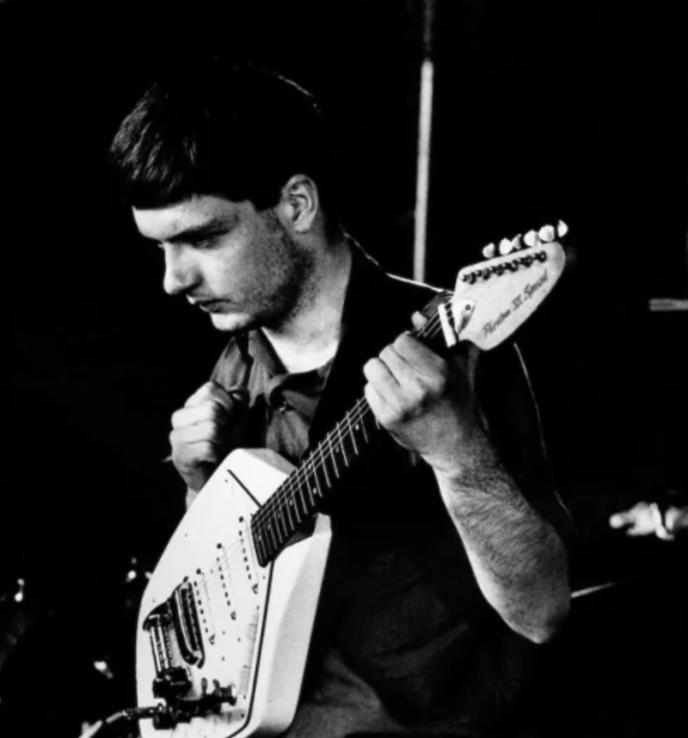 Ian Curtis playing the Vox Phantom on stage